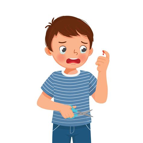 Little boy cut his finger with scissor accidentally crying look at the wound bleeding with blood ...