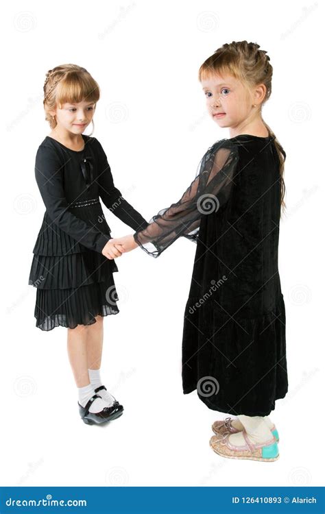 Girls In A Black Dress With A White Collar That Stands In A Stone ...