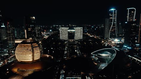 4K航拍移动延时杭州钱江新城CBD夜晚灯光秀视频特效素材-千库网