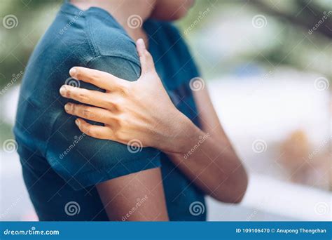 Woman with Pain in Shoulder and Upper Arm Stock Photo - Image of person, injured: 109106470