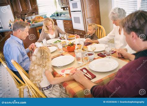 Thanksgiving: Family Has Blessing before Thanksgiving Dinner Stock ...