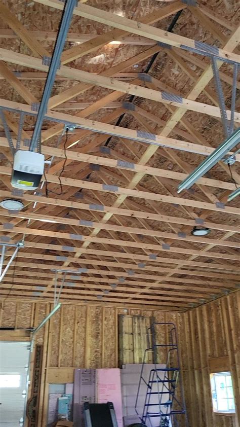 garage ceiling! Here's the plan: 7/16 OSB and vapor barrier for the ...