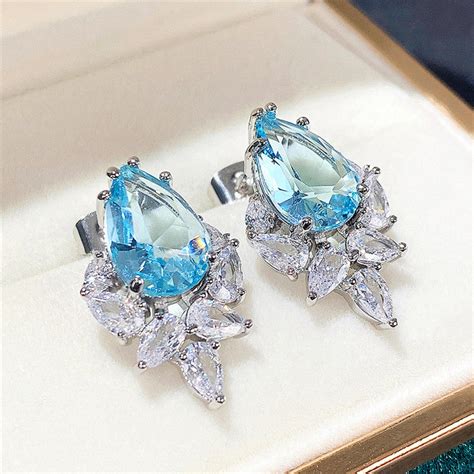 Silver Plated American Diamond Studded Crushed Ice Cut Drop Earrings ...