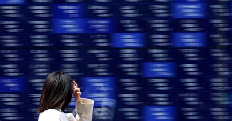 日経平均は5日ぶり反落、米FOMC前の調整で 一時プラス転換 | ロイター
