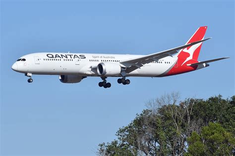 Download Qantas Airways Plane Landing Wallpaper | Wallpapers.com