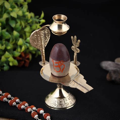 Buy Narmadeshwar Shivling With Trishul , Kalash and Brass Base Online ...