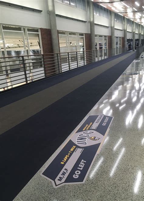 Floor Cling Signage: UNCG Track on Behance