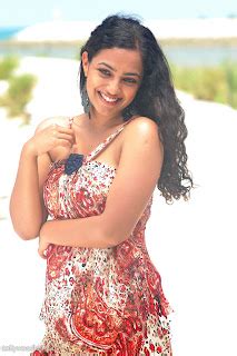 Nitya Menon New Hot Stills from Ala Modalaindhi