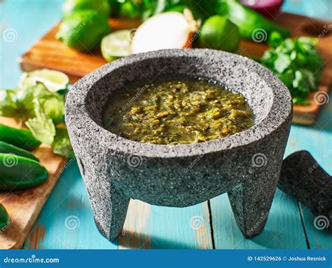 Mexican Salsa Verde in Traditional Stone Molcajete Stock Photo - Image ...