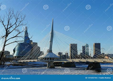 Over the Red River. Winter View on Esplanade Riel Bridge with Canadian ...