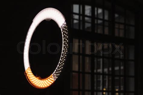 Circular LED light glowing in dark ... | Stock image | Colourbox