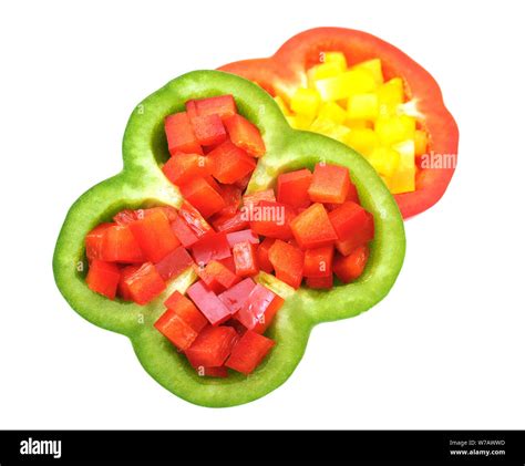 slice of red, yellow and green bell pepper isolated on white background ...