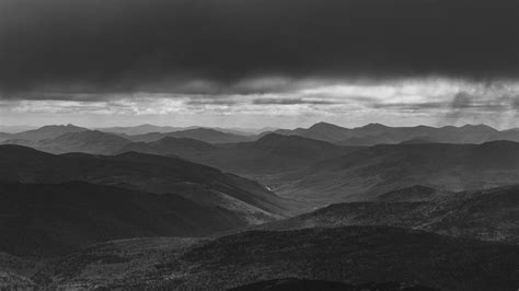 Download Ominous Black-And-White Mountain Range Wallpaper | Wallpapers.com