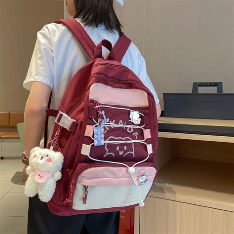 大容量初中生书包男高中大学生ins潮酷2021年新款背包旅行双肩包-阿里巴巴