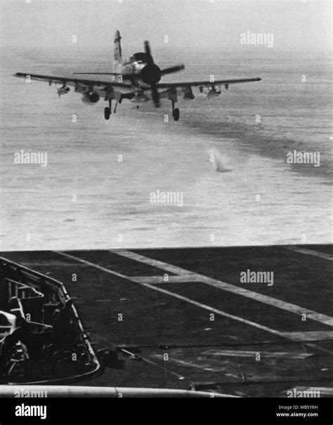 EA-1F of VAQ-33 approaches USS Independence (CVA-62) c1968 Stock Photo ...