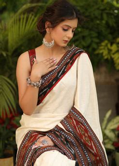 Elegant off-white Cotton saree with beautiful Ikat double border – Sujatra
