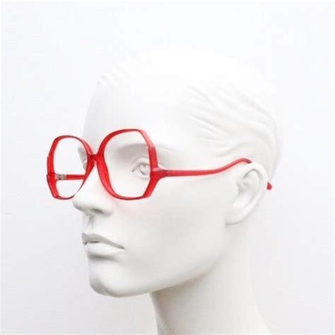 70s Vintage Upside Down Eye Glasses. Elegant Upswept Arms on a Vibrant Red Angular Optical Frame ...