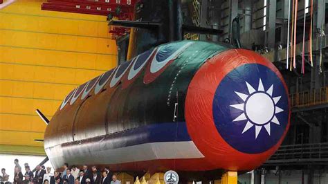 Taiwan unveils first domestically made submarine as tensions with China ...