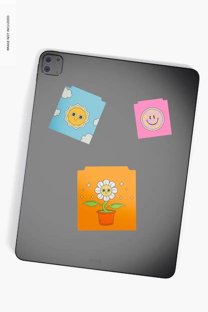 Square adhesive stickers on tablet mockup, top view | Premium PSD