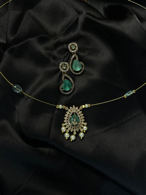 Ad with Pearl drops inivisibe chain – Tara Abharanam