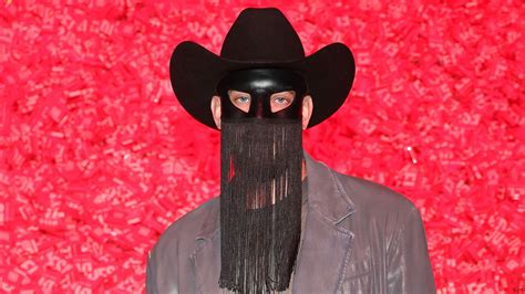 Orville Peck’s real face revealed after country singer is caught ...