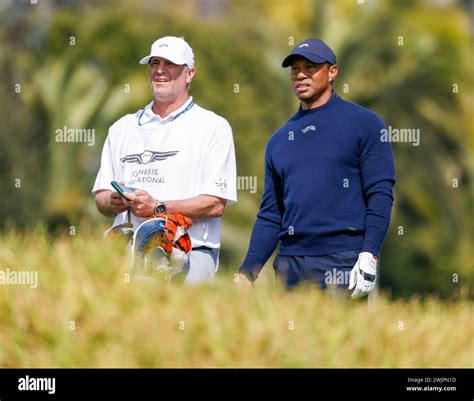 February 16, 2024 Tiger Woods and caddie Lance Bennett during the ...