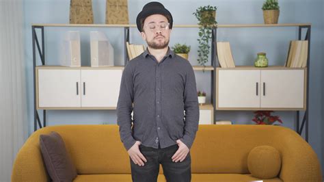 Thoughtful man pacing around the house. 44309124 Stock Video at Vecteezy