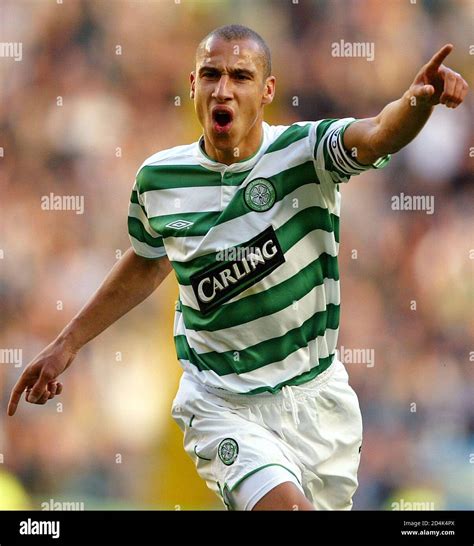 Henrik larsson celebrates scoring celtic hi-res stock photography and ...