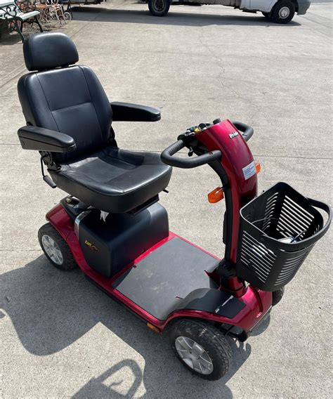 PRIDE COLT PLUS FOUR WHEEL MOBILITY SCOOTER complete with charger and ...