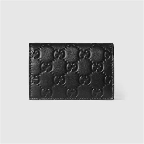 GG Emblem card case in black GG leather | GUCCI® US