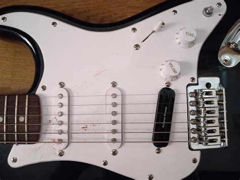 My old strat's pickguard that has never been cleaned. Blood, bloody boogers and maybe some other ...