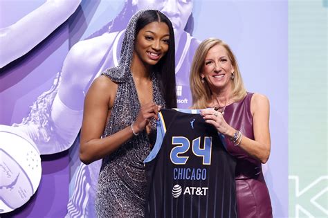 Angel Reese rocks custom diamond grill, sparkling dress at 2024 WNBA Draft