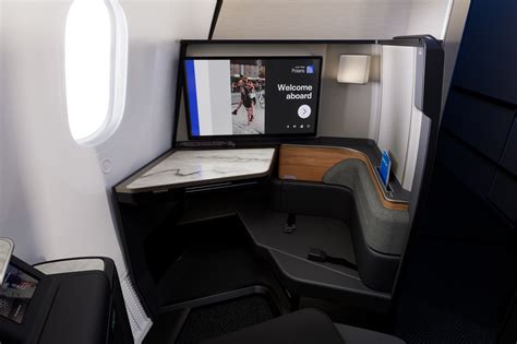 United Airlines unveils new business-class seat that converts to a ...