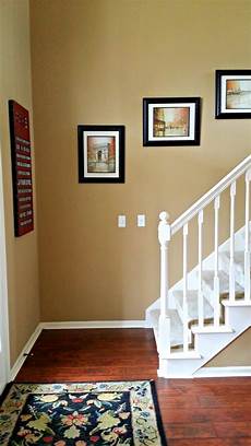 wand gold streichen benjamin spice gold walls cherry floors white trim wand gold streichen benjamin spice gold walls cherry floors white trim
