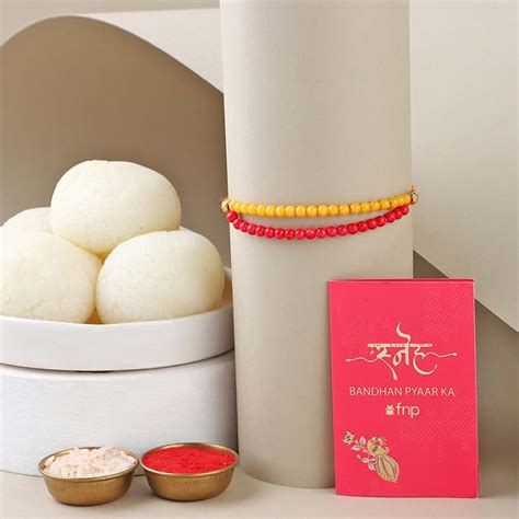 Send Sneh Red and Yellow Bead Rakhi with Rasgulla Singapore Online ...
