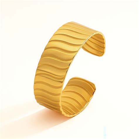 Diorra Golden Drift 18k Gold Statement Bracelet | Mesmerize