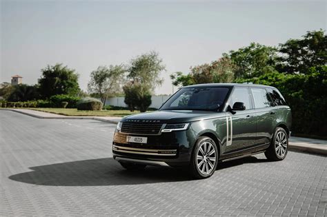 Rent Land Rover Range Rover HSE Green in Dubai - SUV - Octane.Rent