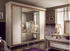 Classic Raffaello Wardrobe by Classical Dining Tables In Wood Decorated With Gold Leaf Classic Raffaello Wardrobe
