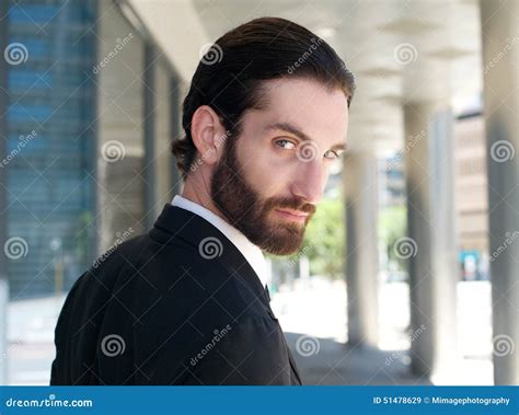 Handsome Businessman Looking Over Shoulder Stock Image - Image of ...