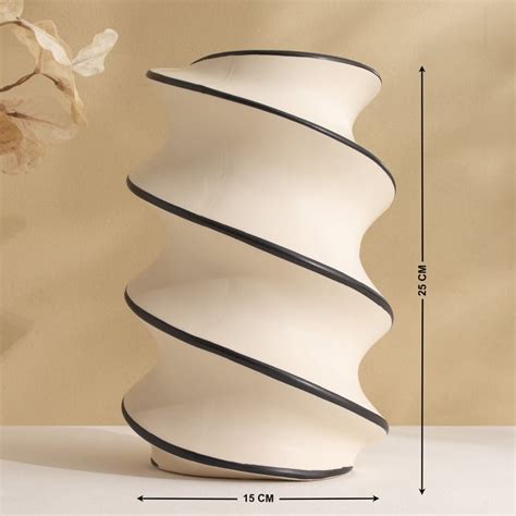 Buy Romo Est Nova Ceramic Spiral Vase from Home Centre at just INR 1999.0