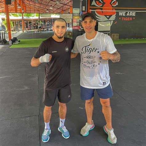 Download Muhammad Mokaev Posing At Gym Wallpaper | Wallpapers.com