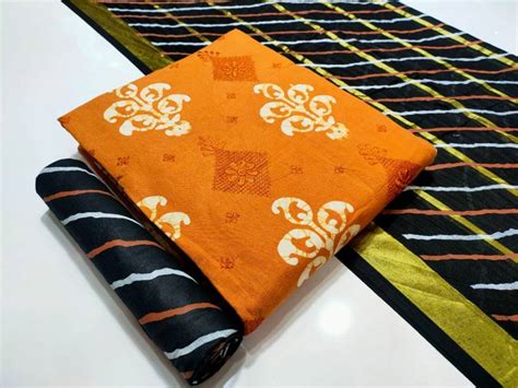 Nemi Wax Batik Gold Print 4 Regular Wear Dress Material