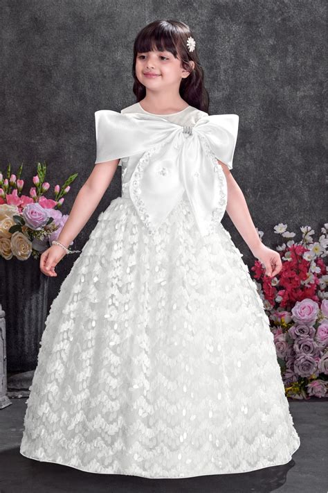 White Party Wear Gown with Statement Bow And Textured Skirt For Girls ...