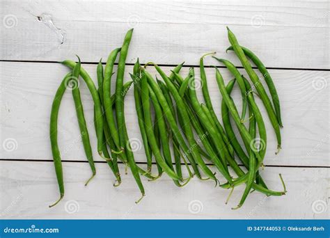 Green String Beans with Kitchen Utensils, Close-up, Isolated on White ...