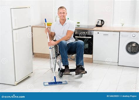 Handicapped Man Mopping Floor Stock Image - Image of cleaning, home ...
