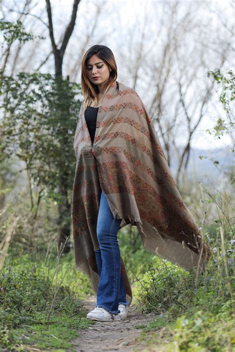 Solid brown colour shawl with flower pattern style bold and dense