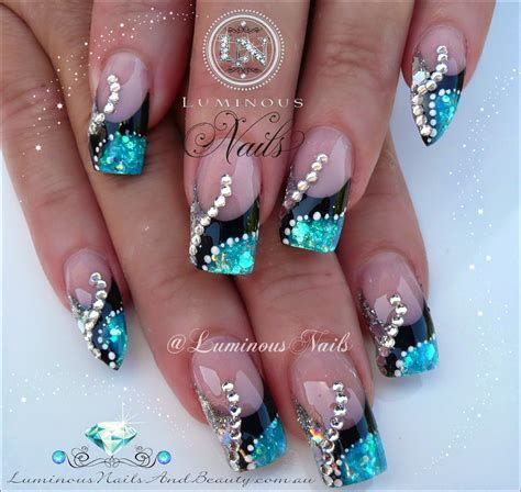 Teal and black with rhinestones | Silver nail designs, Luminous nails ...