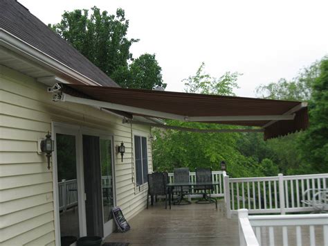 Soffit mounted Eastern Sunflex retractable awning | Kreider's Canvas ...