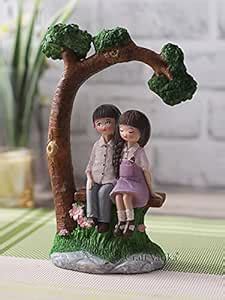 Buy CraftVatika Romantic Love Couple Sitting on Bunch Miniature Statue ...