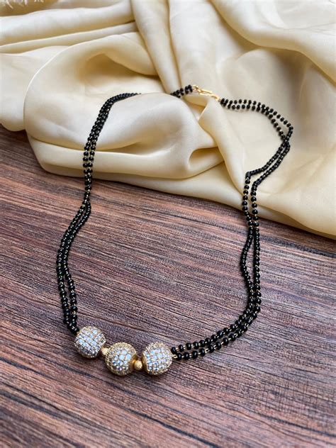 Pakhi Inspired Sleek Antique Golden Ball Mangalsutra